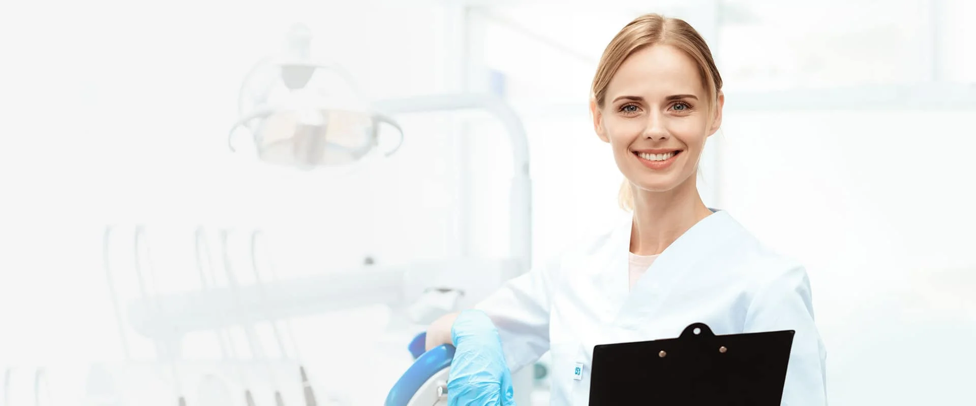 dentist with notepad in her hand